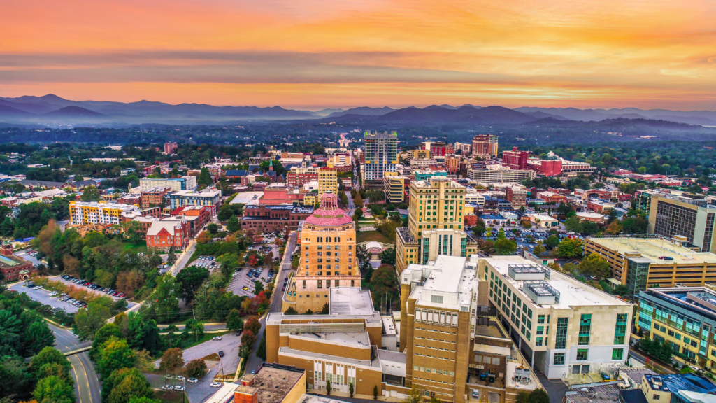 Asheville's gorgeous skyline, cradled in the beautiful Blue Ridge Mountains!  There are many outstanding options for North Carolina overnight trips here!